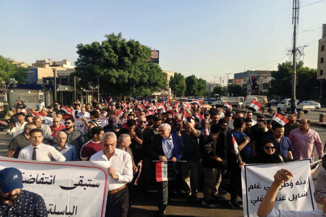 العراقيون يحيون ذكرى ثورة تشرين وسط إجراءات أمنية مشددة